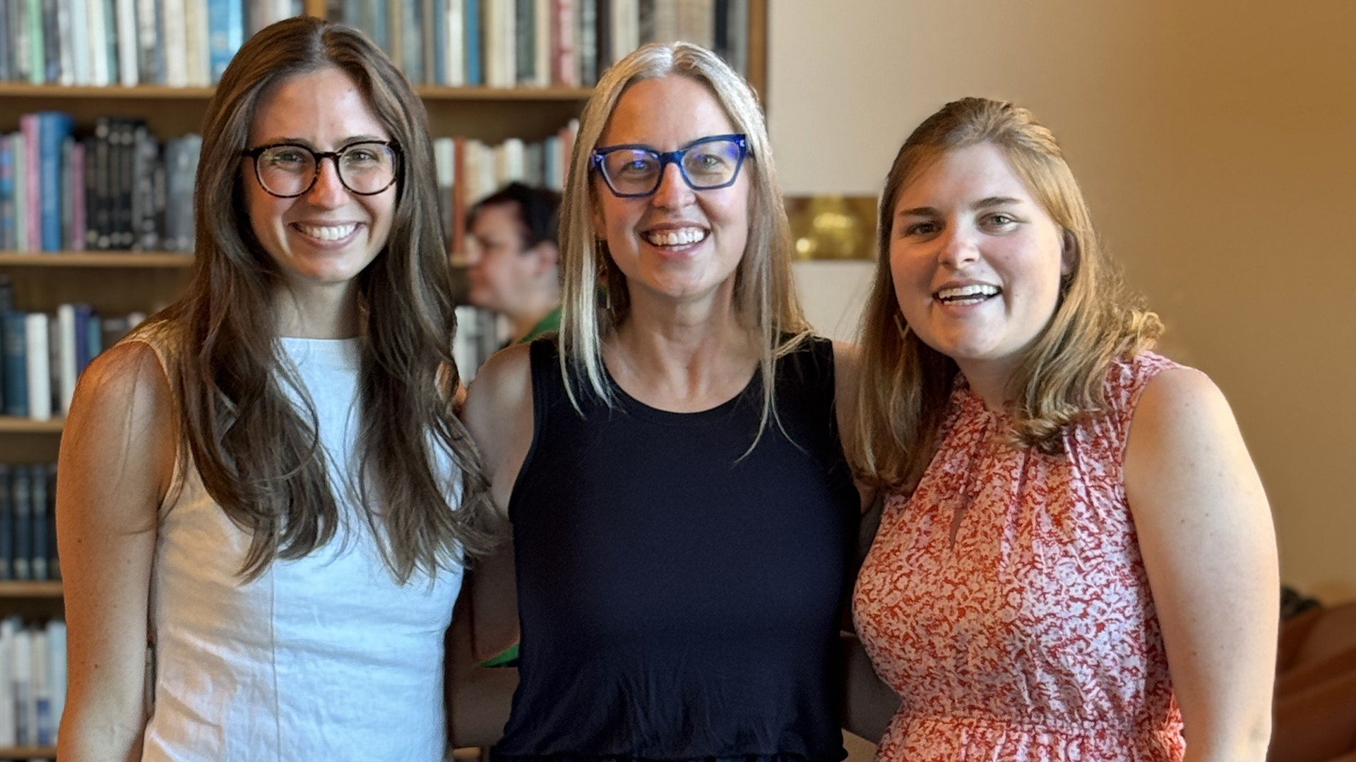 Alissa Smith, Heather Feldner, and Mia Hoffman smile at the camera.