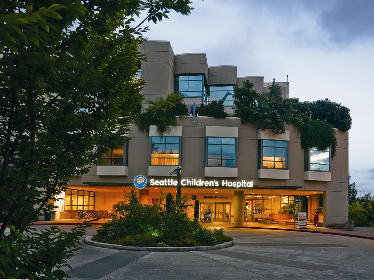 The entrance to Seattle Children's Hospital at dusk. 