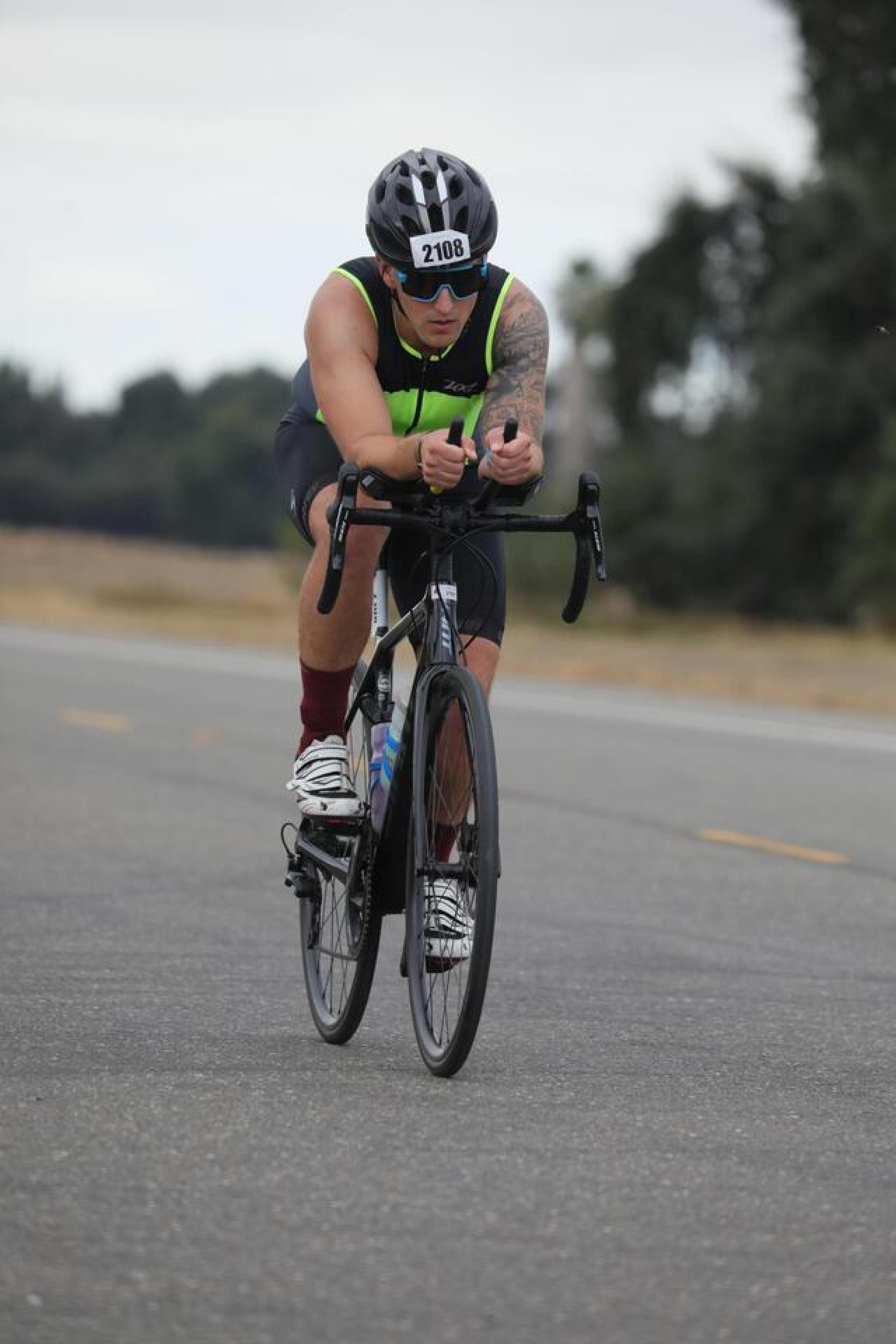 Kevin rides his bike during the Ironman. 