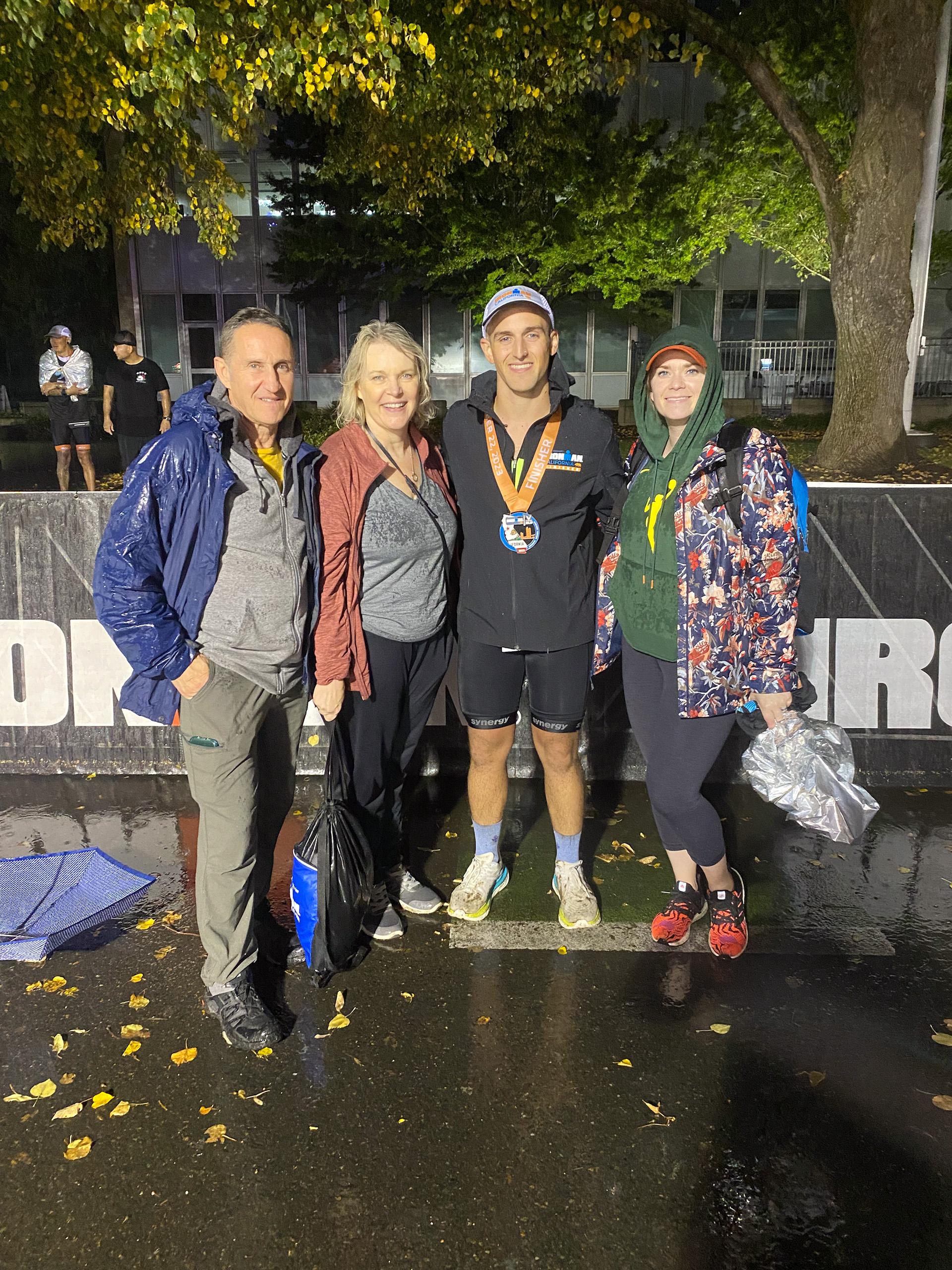 Kevin, third from left, stands with his family after the race. 