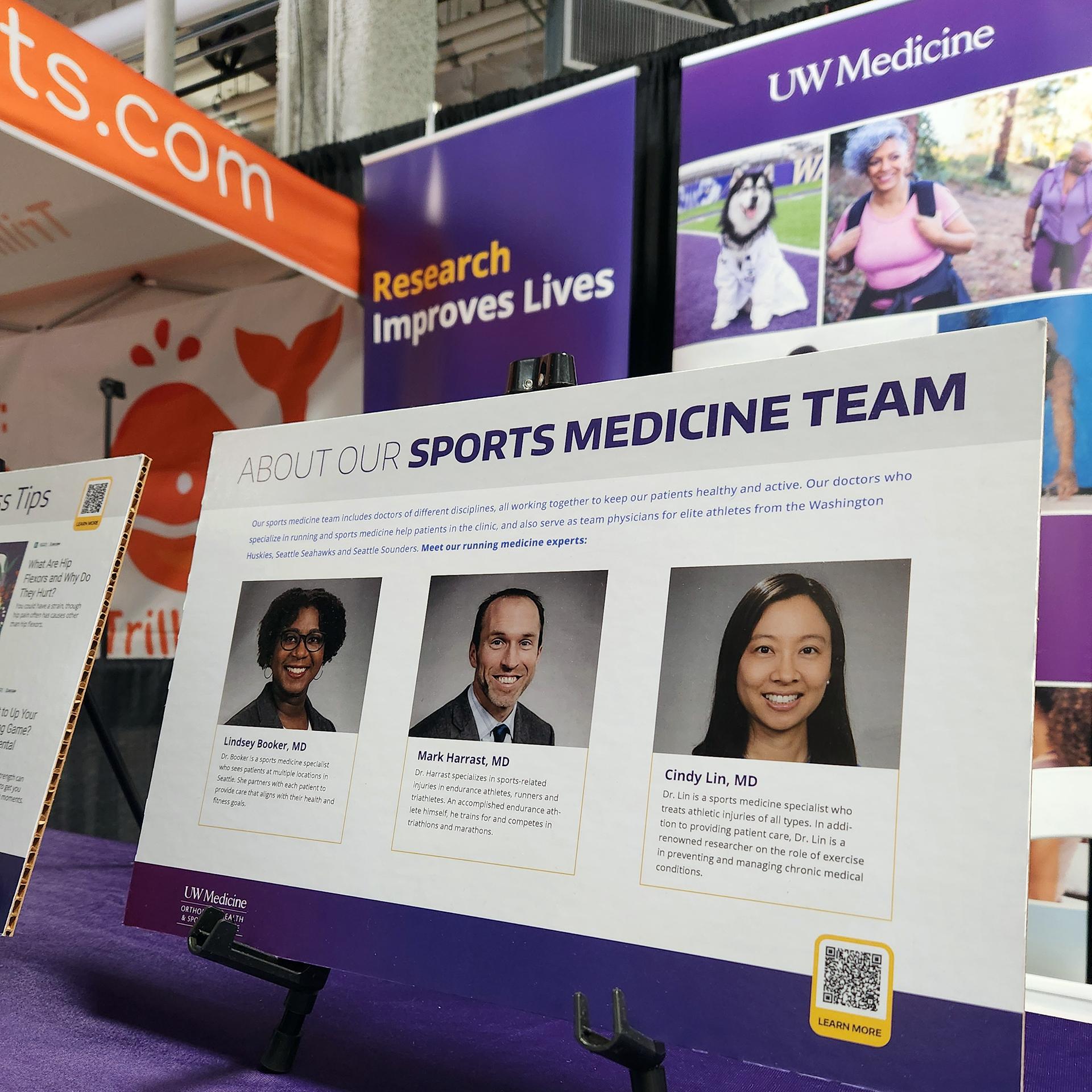 A close-up of a display showing information about UW Medicine Sports Medicine Team. 