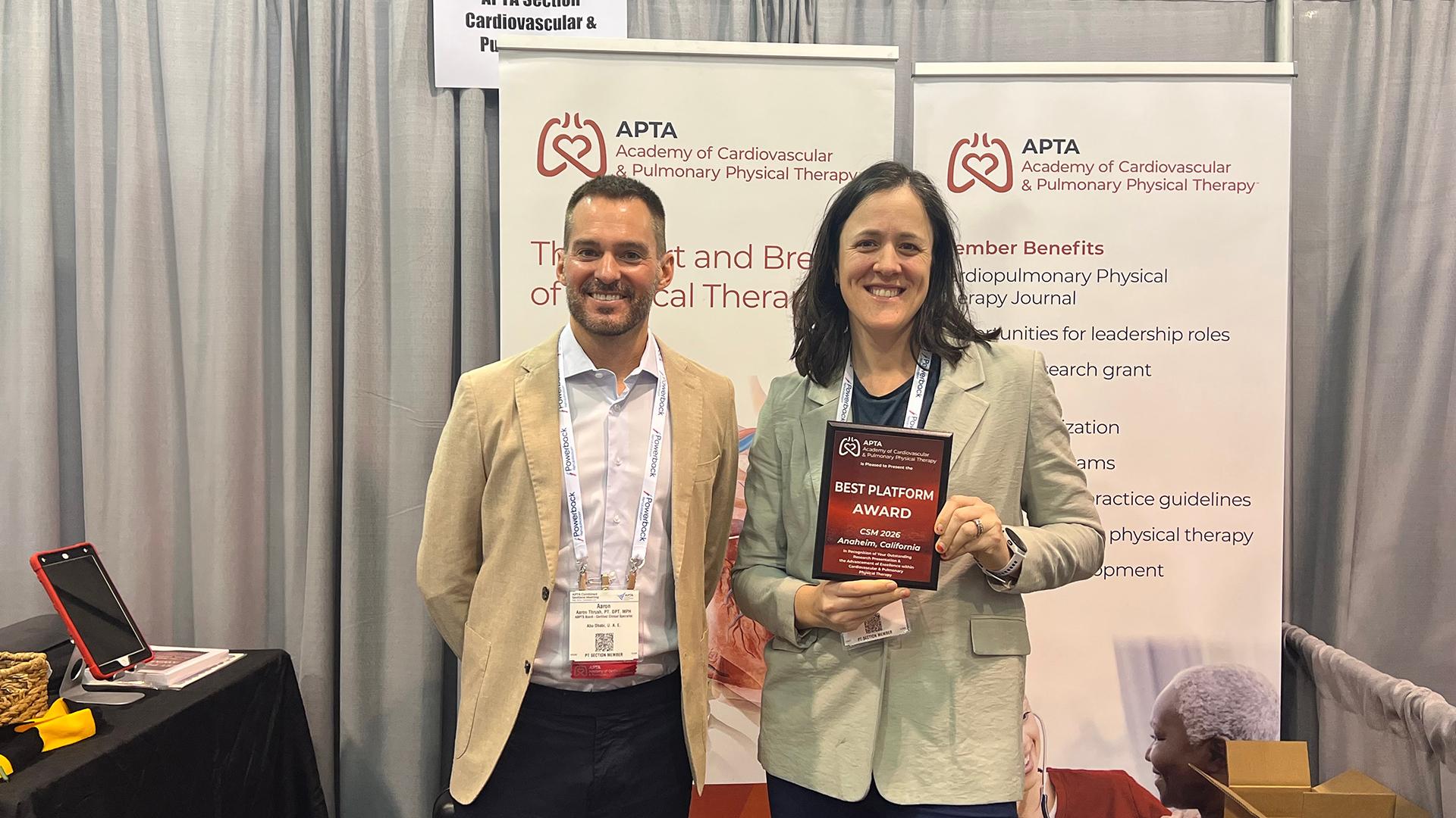 Claire Child, right, receiving her APTA award. 